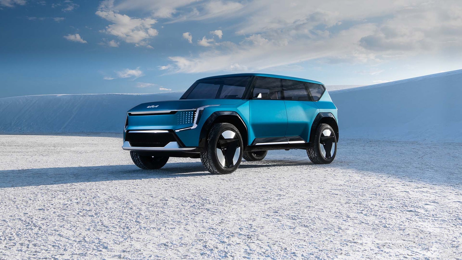 Kia EV9 electric SUV parked in snowy landscape