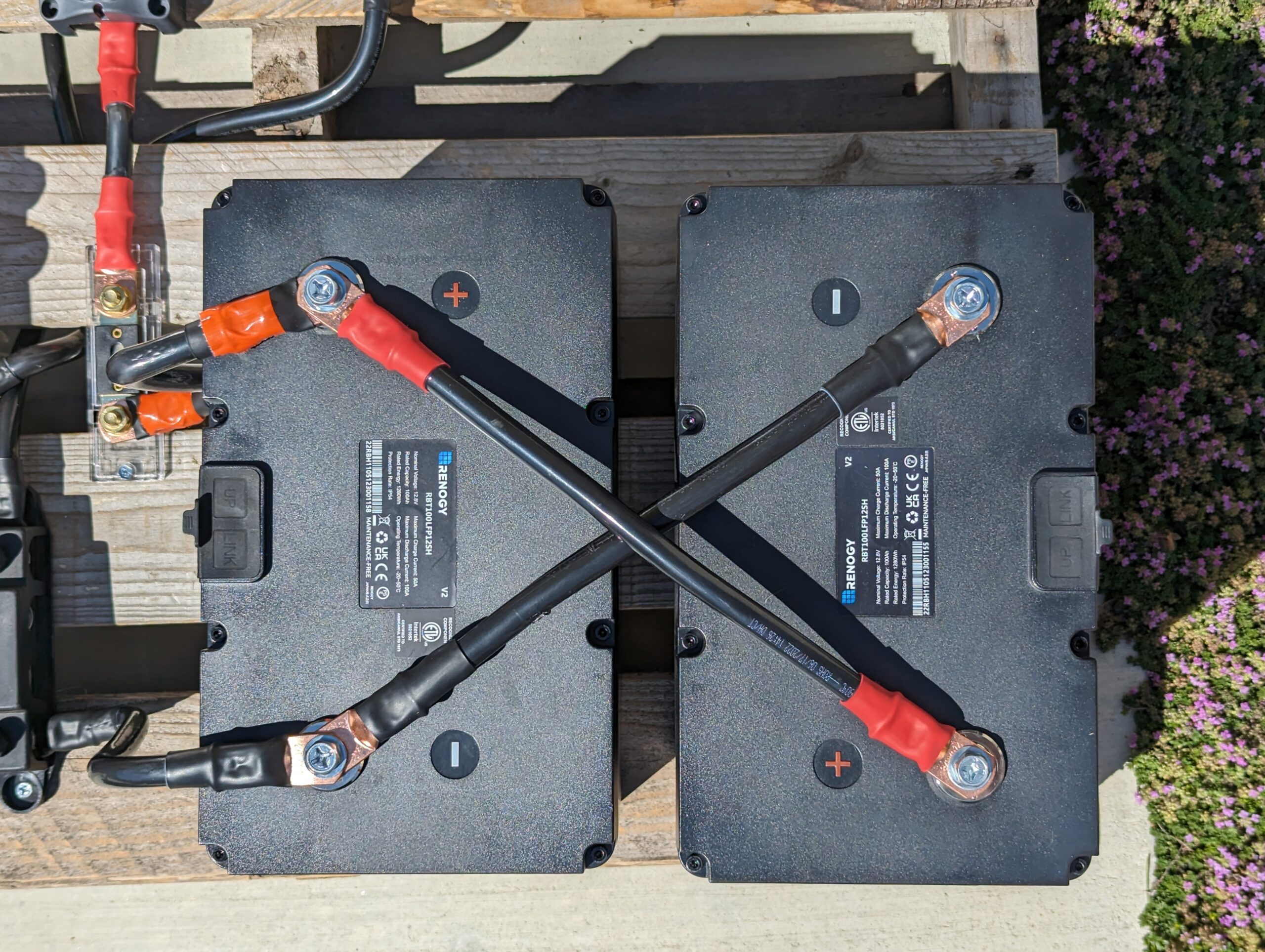 A pair of Renogy's 100Ah iron phosphate battery cells all wired up